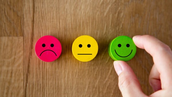 Customer service evaluation and satisfaction survey concepts. The client hand picked the happy face smile icon.